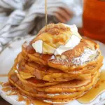 Fluffy Pumpkin Pancakes with Maple Syrup & Whipped Cream
